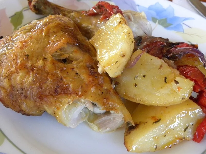 Crispy roasted chicken thigh with potatoes image