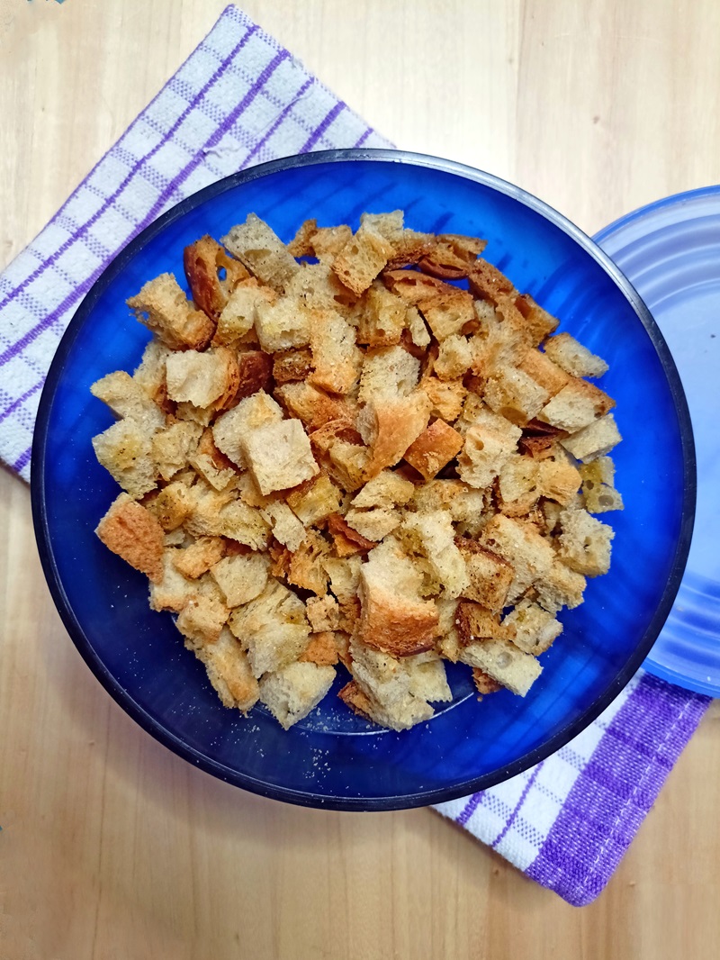 Homemade croutons in a blue bowl image