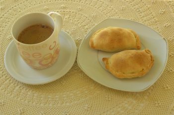 Kolokotes with a cup of coffee image
