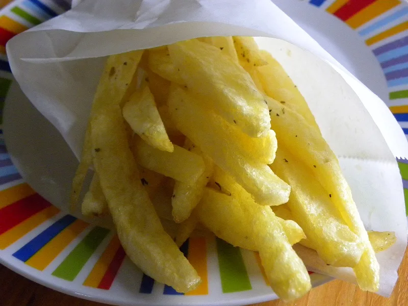 fried potatoes wrapped in paper image