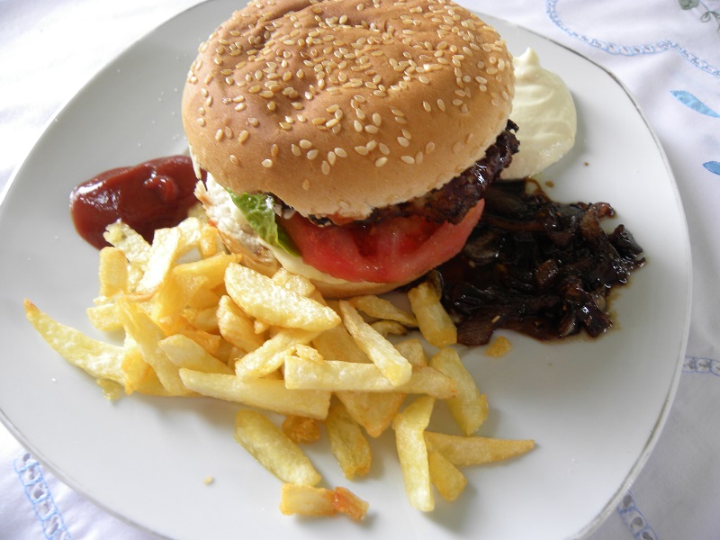mpifteki burger with fried potatoes image
