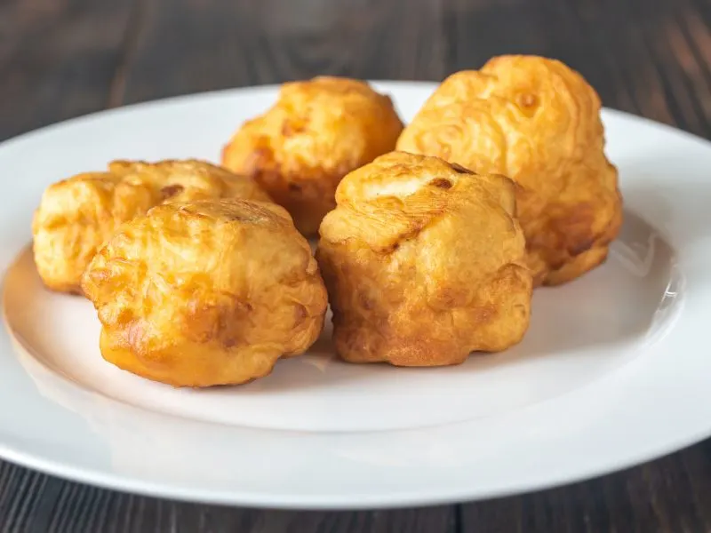 Battered cauliflower in white plate image