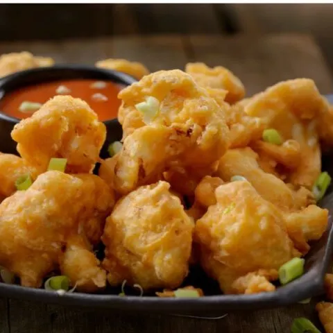 Battered cauliflower with sauce image