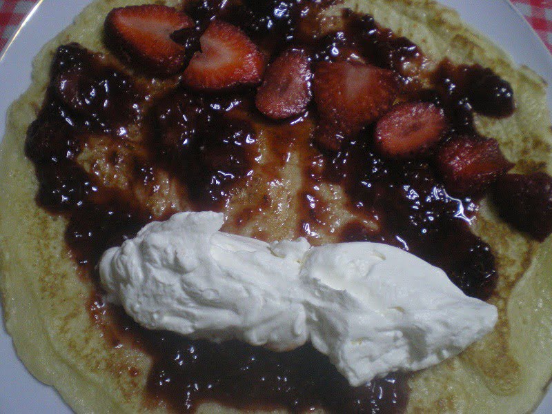 Crepe with strawberries and whipped cream image