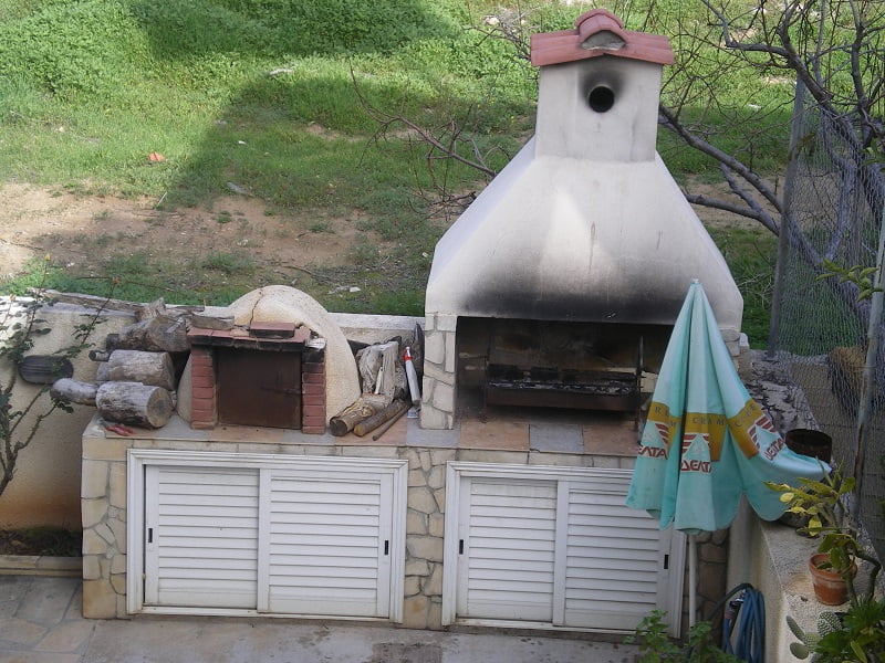Wood fired oven and barbecue image