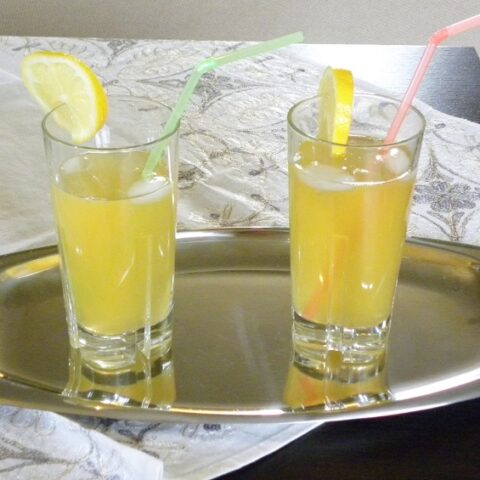 Two glasses of Lemonade in a tray image