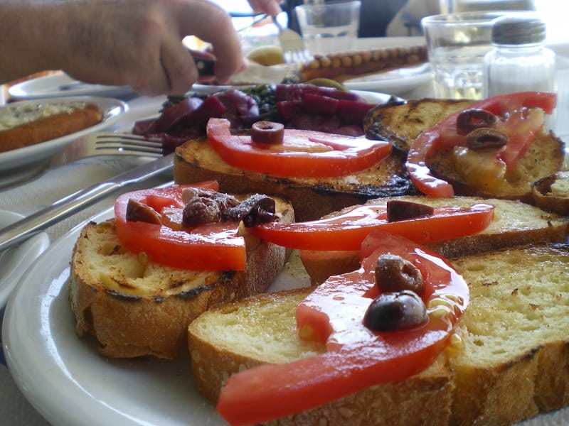 Greek bruschetta with tomato and olives image