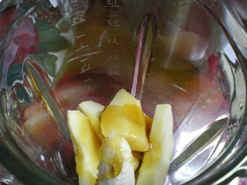 Peeled fruit in a blender image