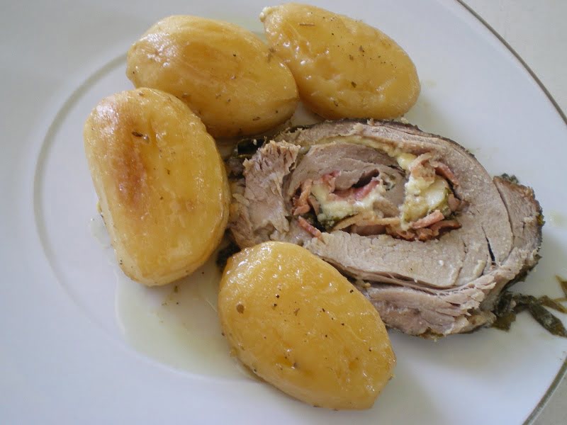 Stuffed pork roast served image