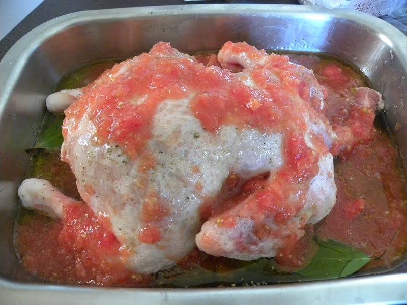 chicken with grated tomato before baking image