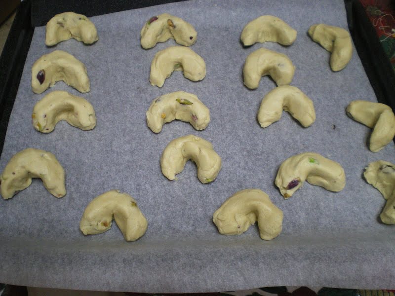 Crescent shaped kourabiedes with pistachios image