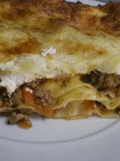 Lasagna with ground meat and anthotyros image