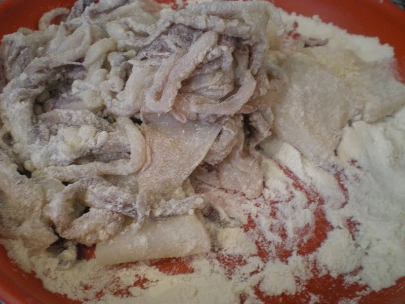 coating kalamari in flour image