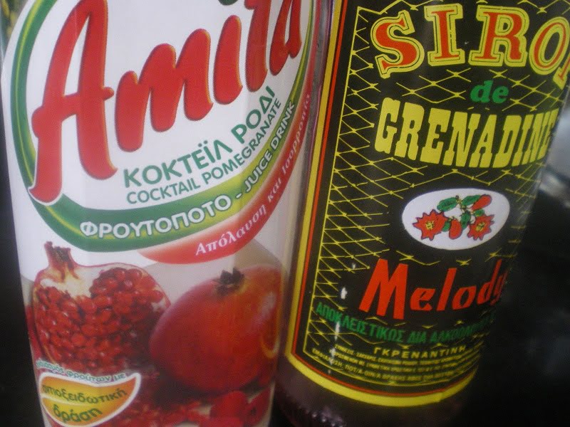 Pomegranate juice andd grenadine image