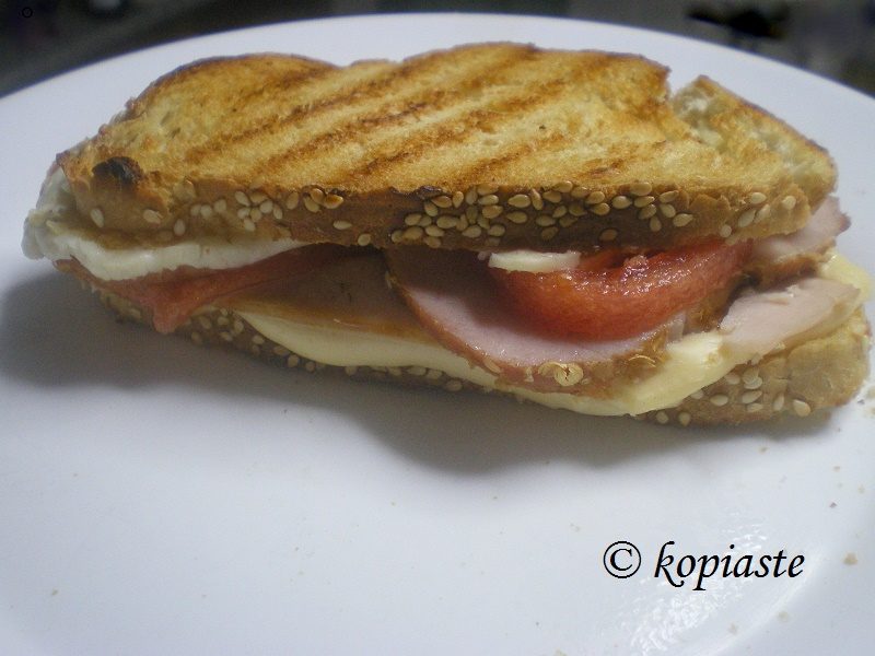 Sandwich with lountza and halloumi