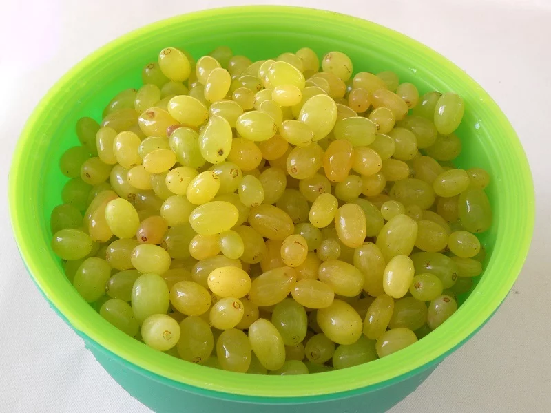 Grapes washed in a colander image