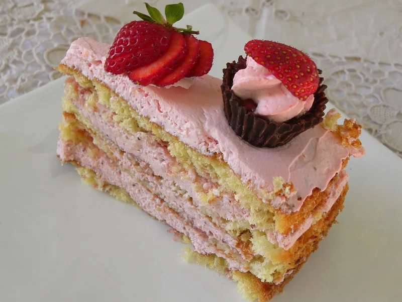 A piece of strawberry mousse cake image