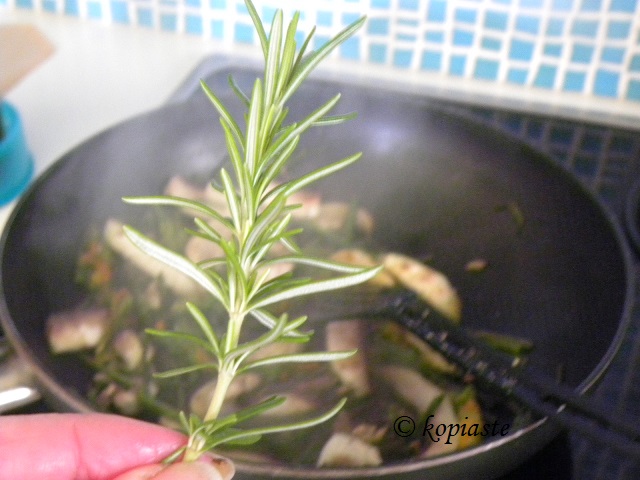 adding fresh rosemary