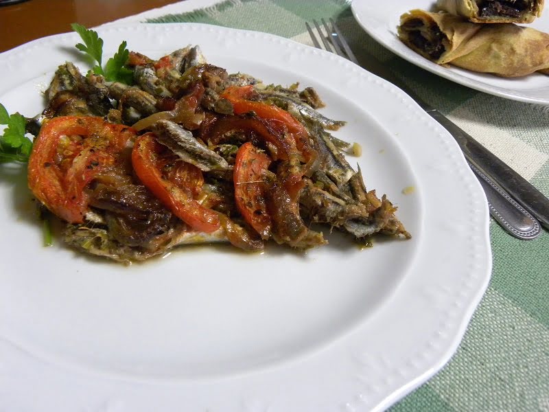 Baked anchovies gavros plaki photo
