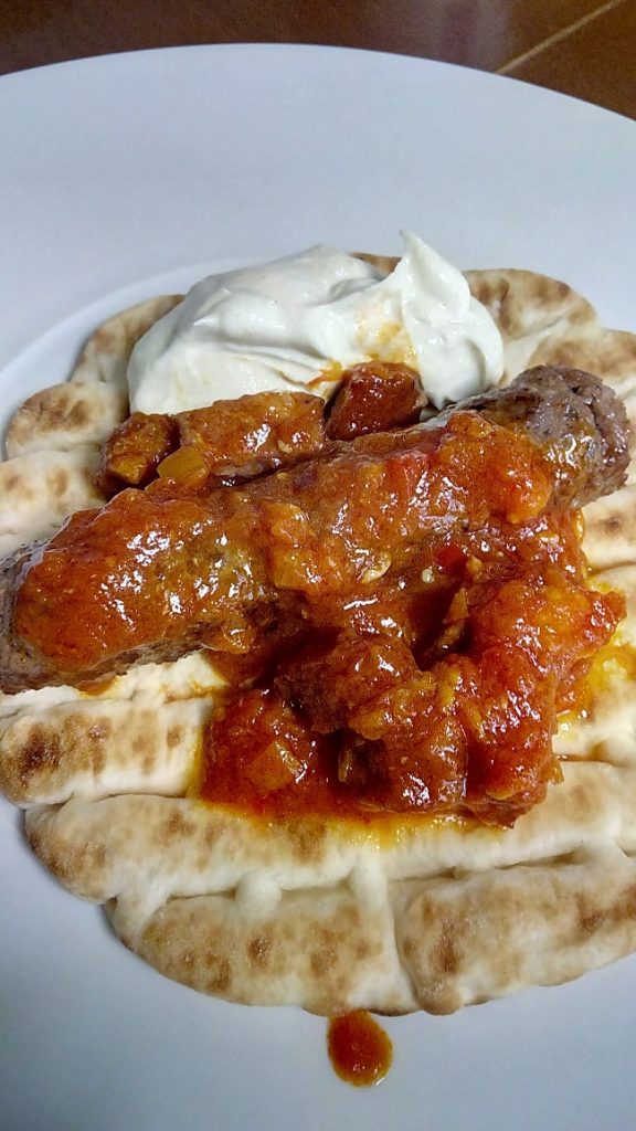 Kebab served with spetzofai image