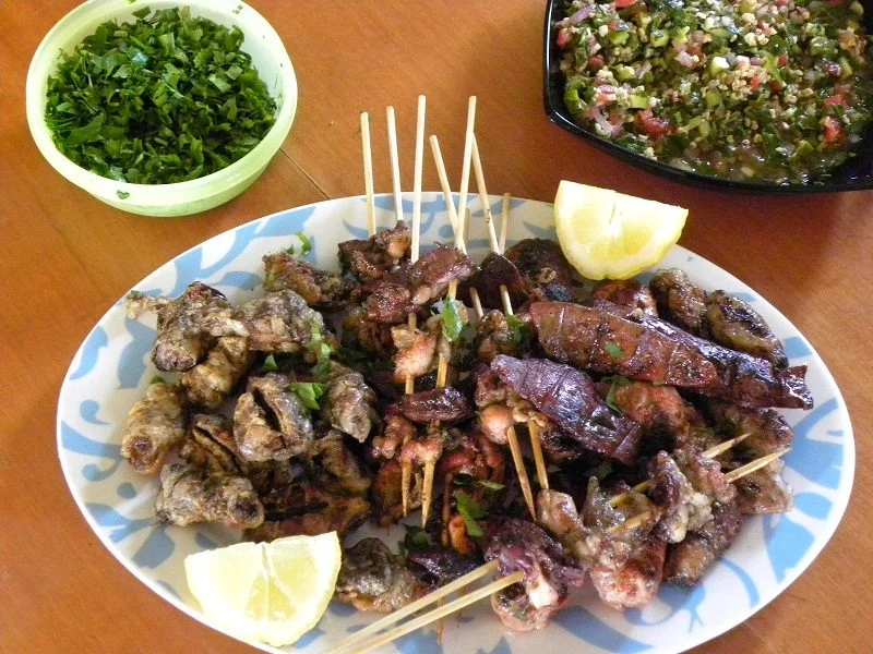 Tourkakia liver skewers served image