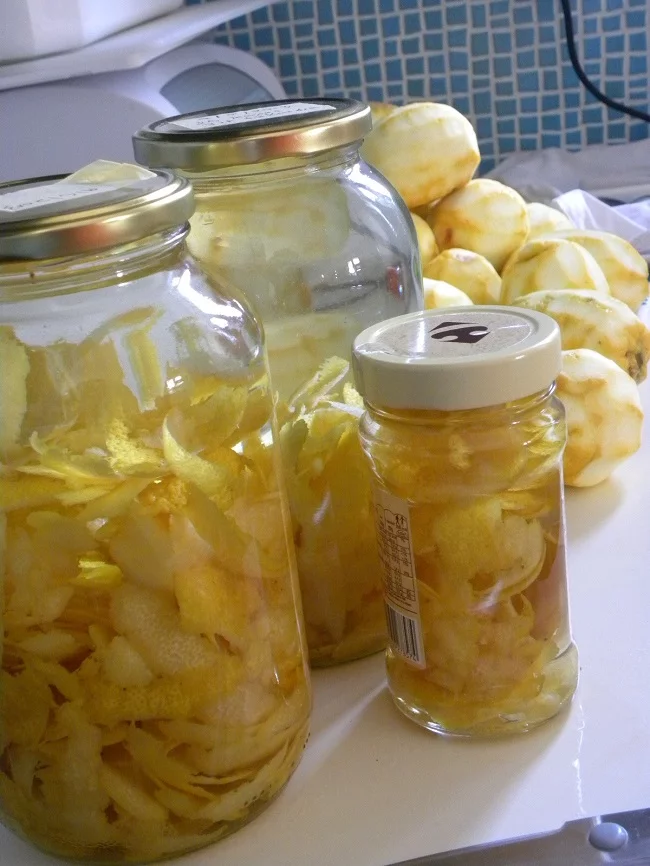 Lemon peels steeping in tsipouro image