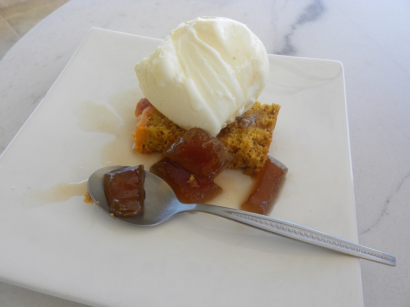 Cake with ice cream and watermelon rind preserve image