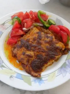 Vegetarian moussakas served with salad image