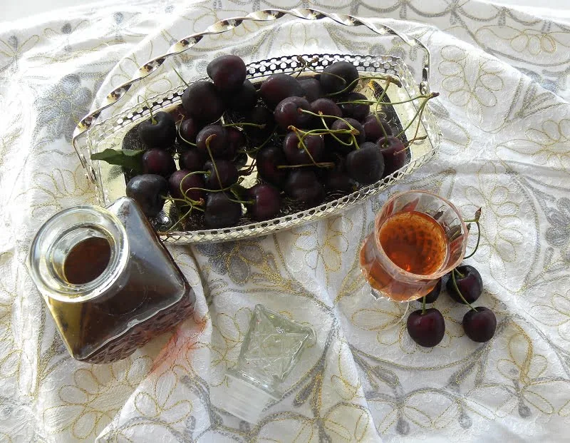 Cherry Liqueur in a bottle and glass picture