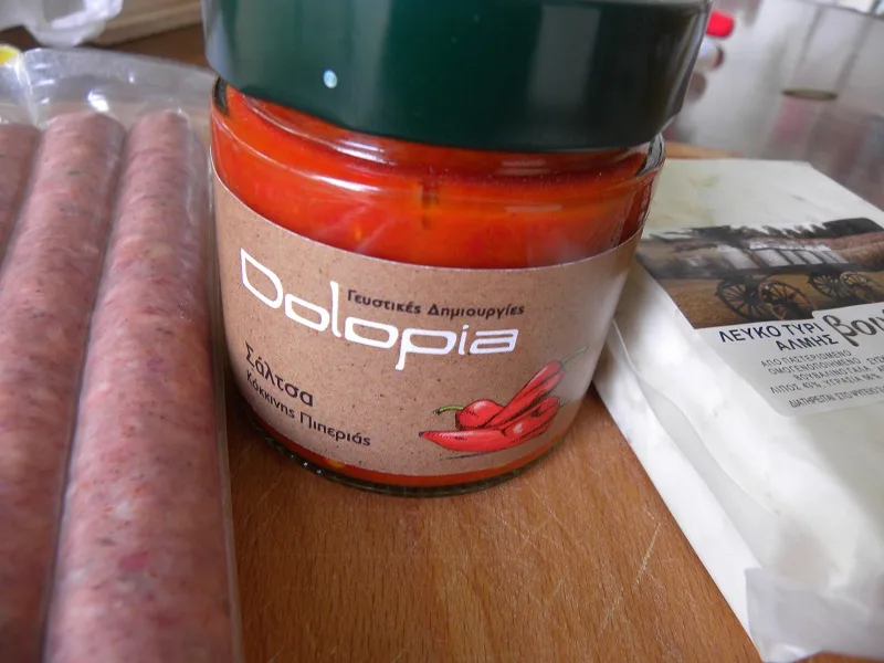 Greek sausages, red pepper dip and buffalo white cheese image