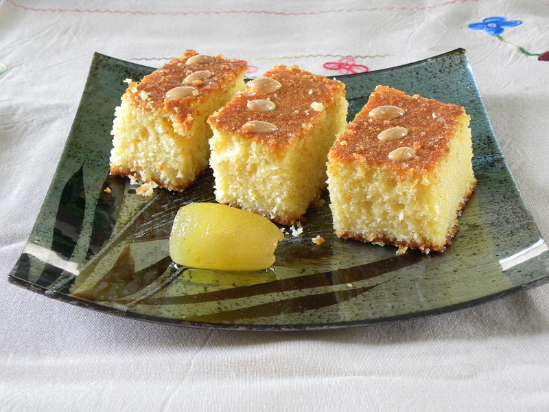 Three slices of revani with bergamot preserve image