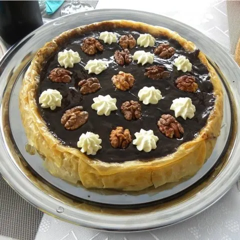 Baklavas tart with whipped cream image