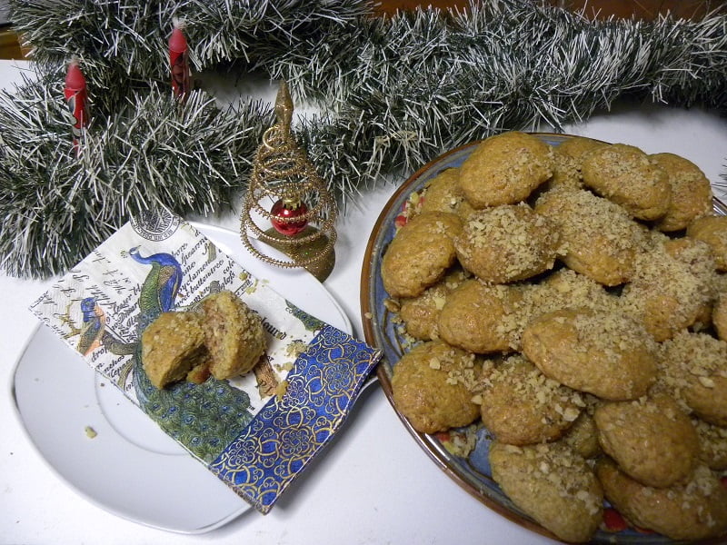 Melomakarona stuffed with white chocolate raspberry jam and walnuts image