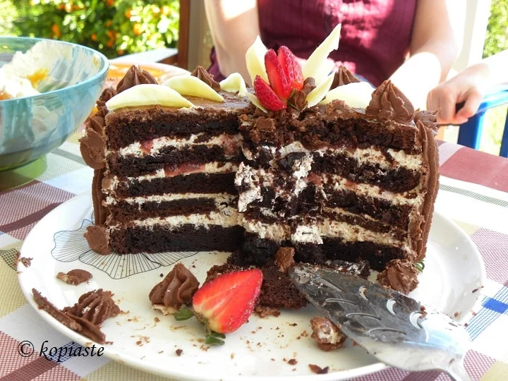 Strawberry chocolate cake cut