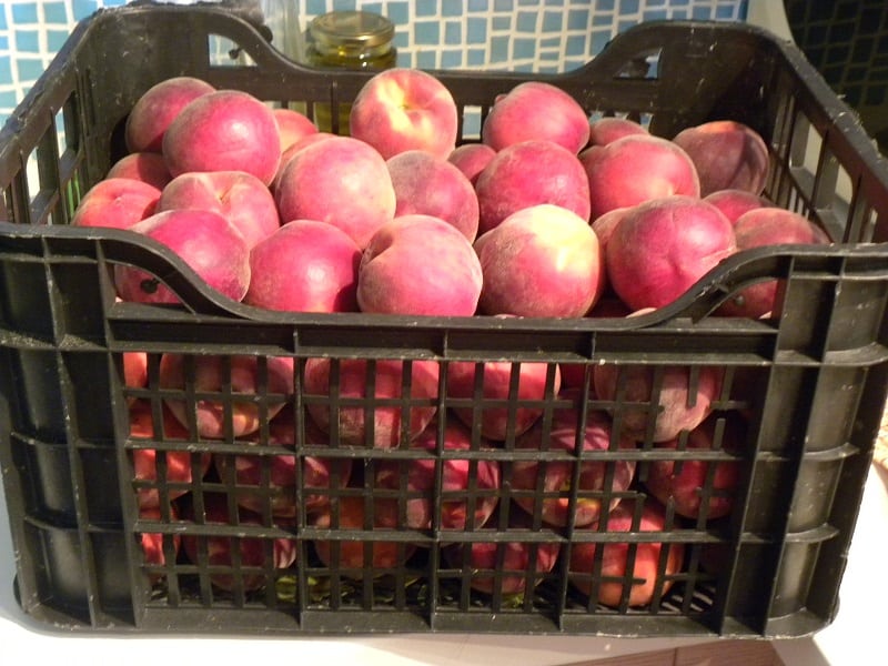 A crate of peaches image