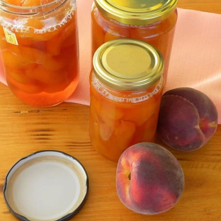peach compote in jars image