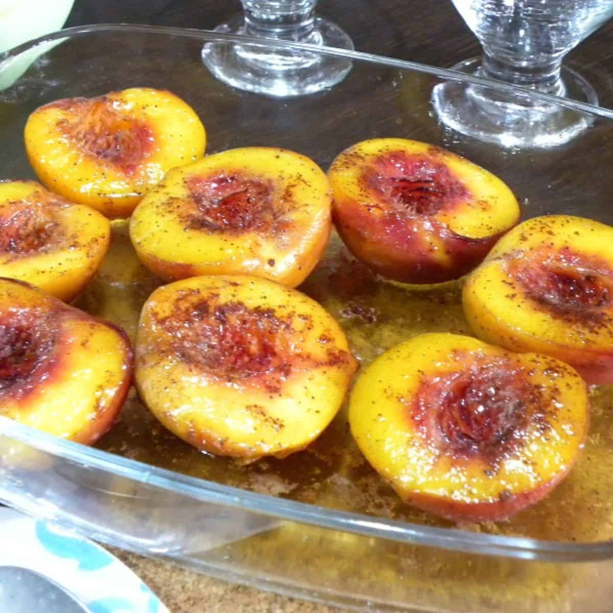 Baked peaches in the oven image