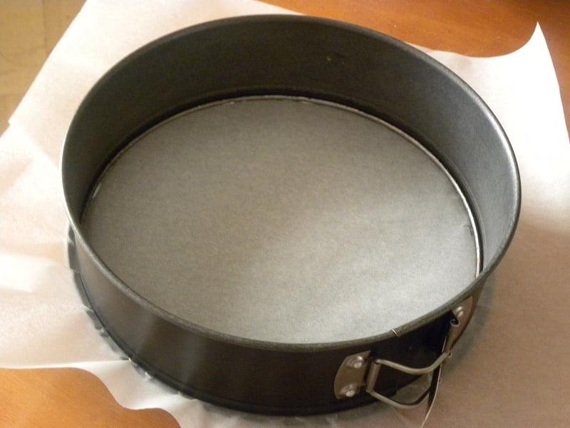 Spring form pan with parchment paper image