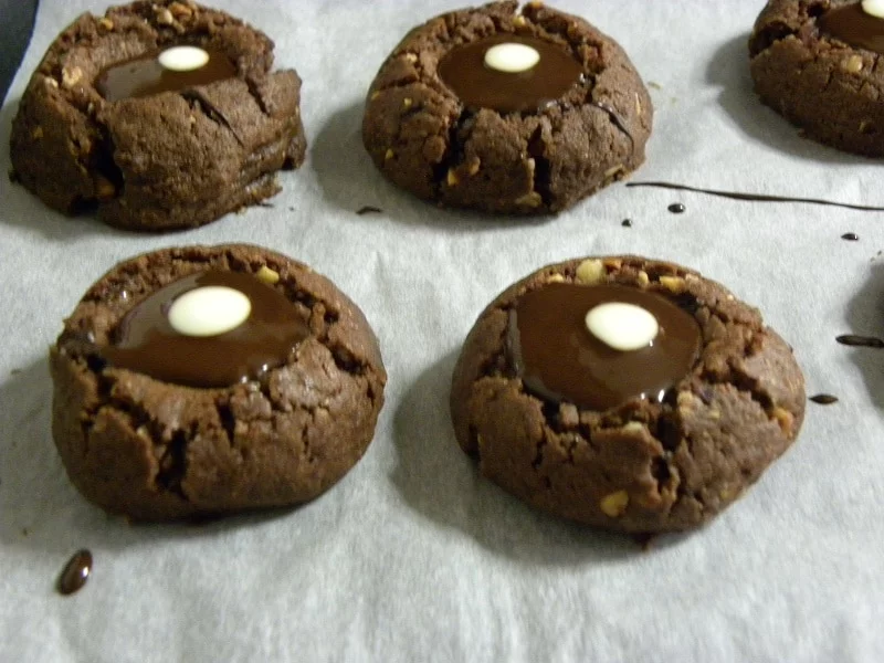 chocolate thumbprint cookies with dot image
