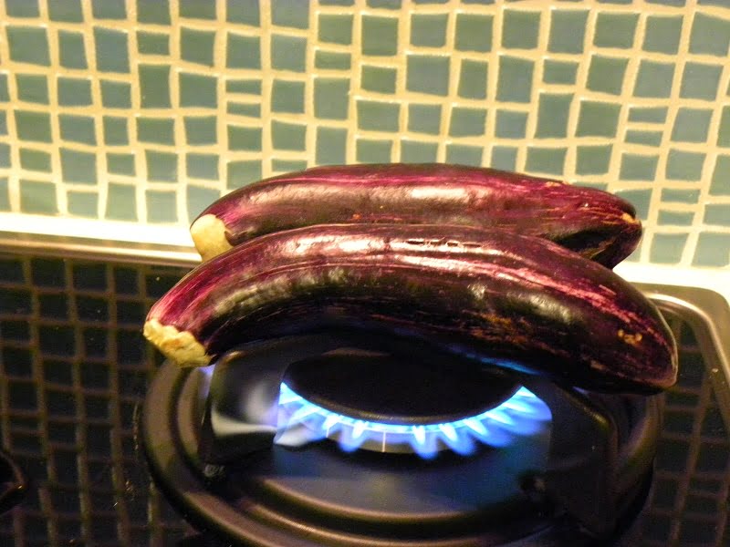 Charring eggplants image