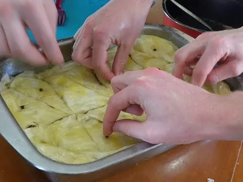 Putting cloves in the phyllo image