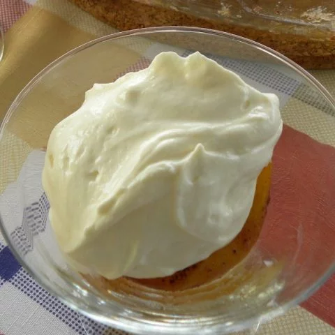 Baked peaches with vegan coconut whipped cream image