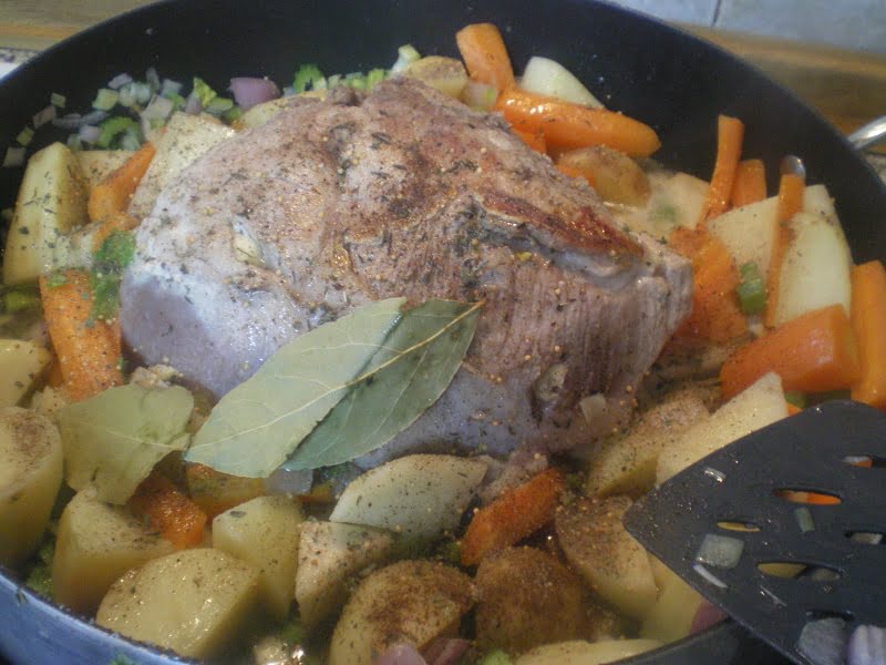Cooking the pork and vegetables in a crock-pot image