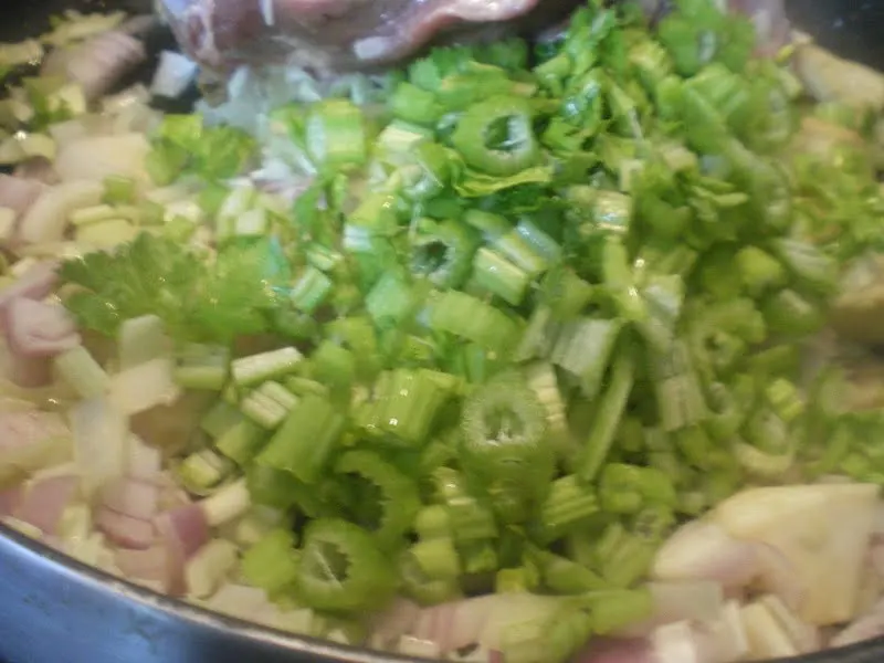 Sauteing the onions leek and celery image