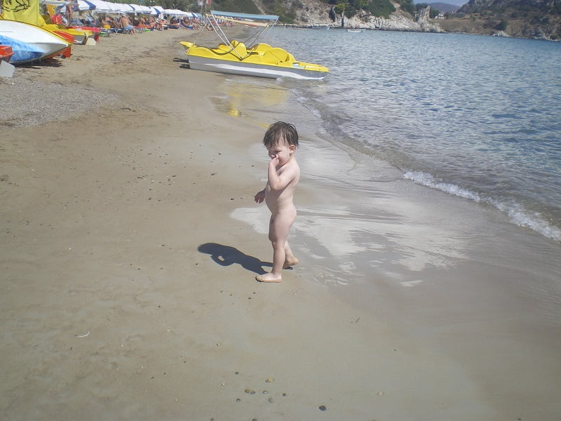Nude baby at Tolo beach image