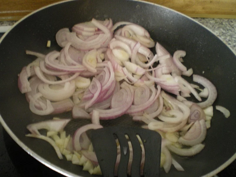 Sauteing onion and garlic image
