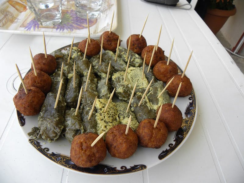 Appetizers meatballs and dolmades image