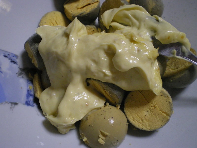 Egg yolks with mayonnaise and mustard image