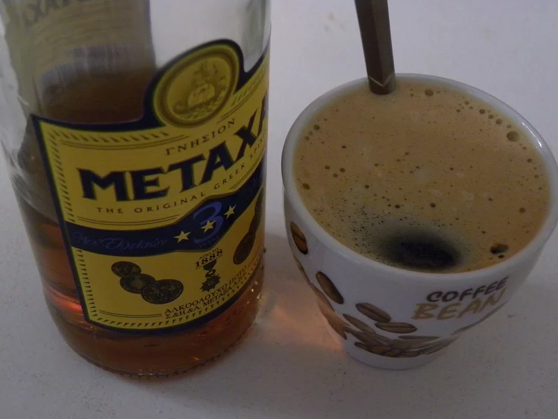 Espresso coffee with metaxa brandy image
