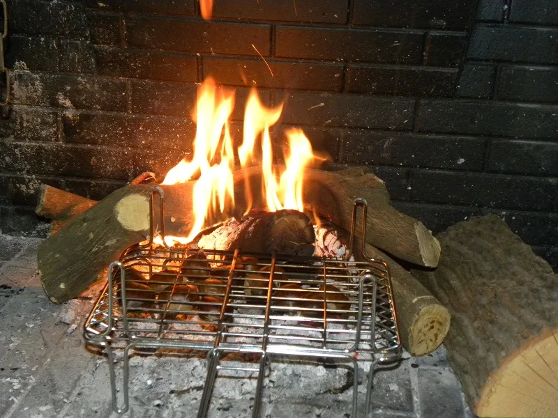 Roasting chestnujts on the fireplace image